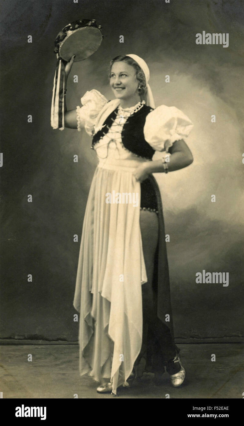 Woman tambourine traditional costume hi-res stock photography and images -  Alamy