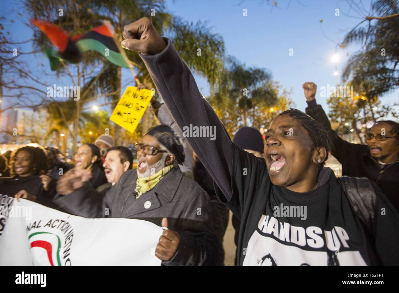 Los Angeles, California, USA. 29th Dec, 2014. Demonstrators march after an autopsy report released on the Ezell Ford shooting on Monday. The Ford shooting death by Los Angeles police sparked months of protests and calls by community activists for a transparent investigation. Ford was shot once in the right side of his back, once in the right arm and once in the right abdomen, according to an autopsy released today. © Ringo Chiu/ZUMA Wire/Alamy Live News Stock Photo