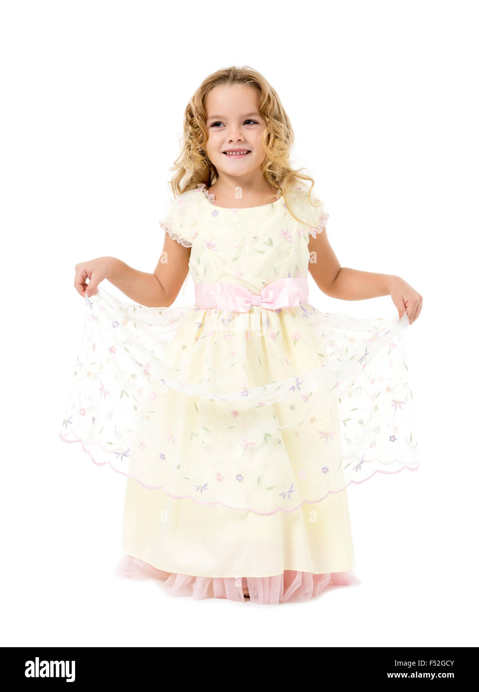 Little Girl in a Light Dress Posing, on white background Stock Photo ...