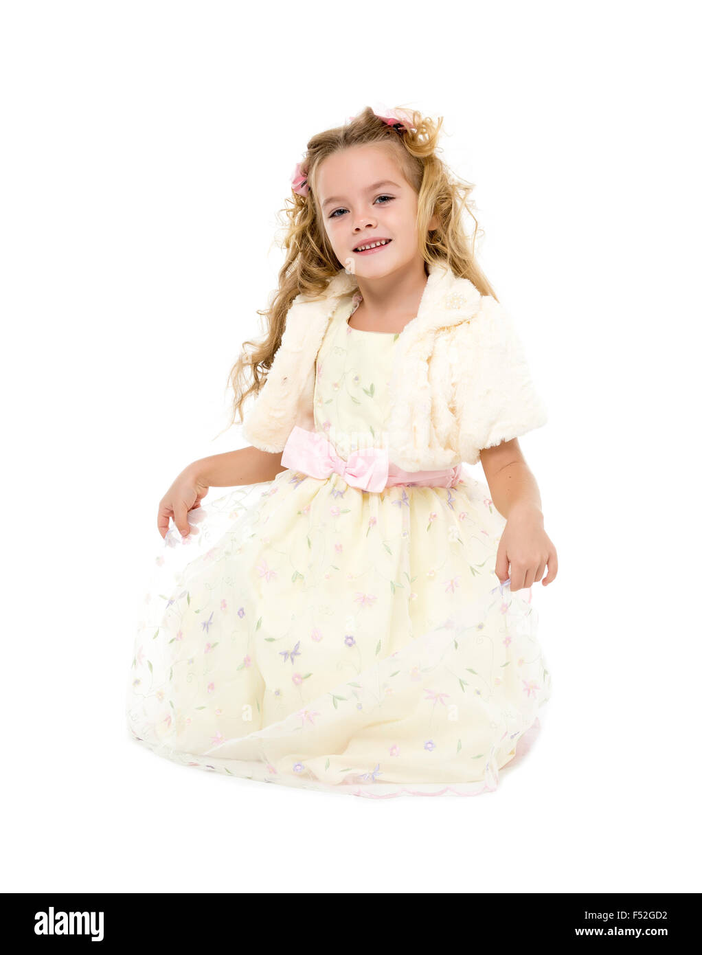 Little Girl in a Light Dress Posing, on white background Stock Photo ...