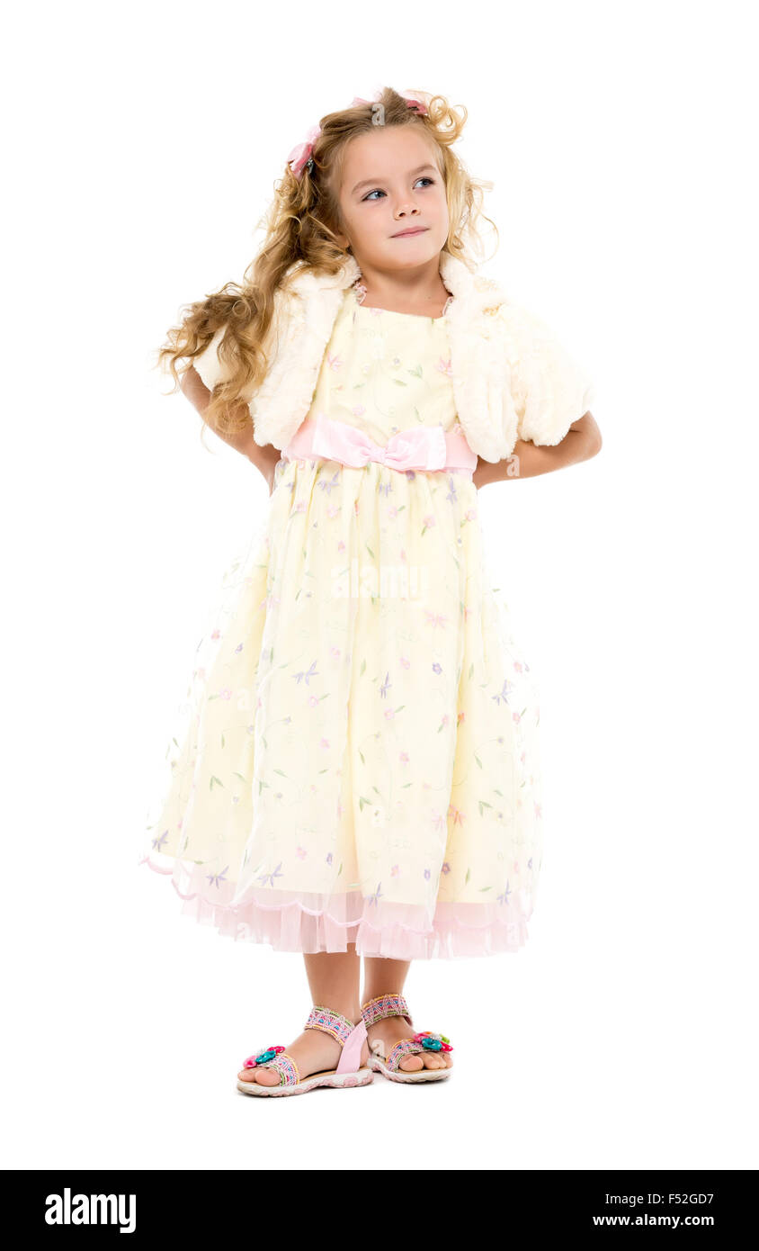 Little Girl in a Light Dress Posing, on white background Stock Photo ...