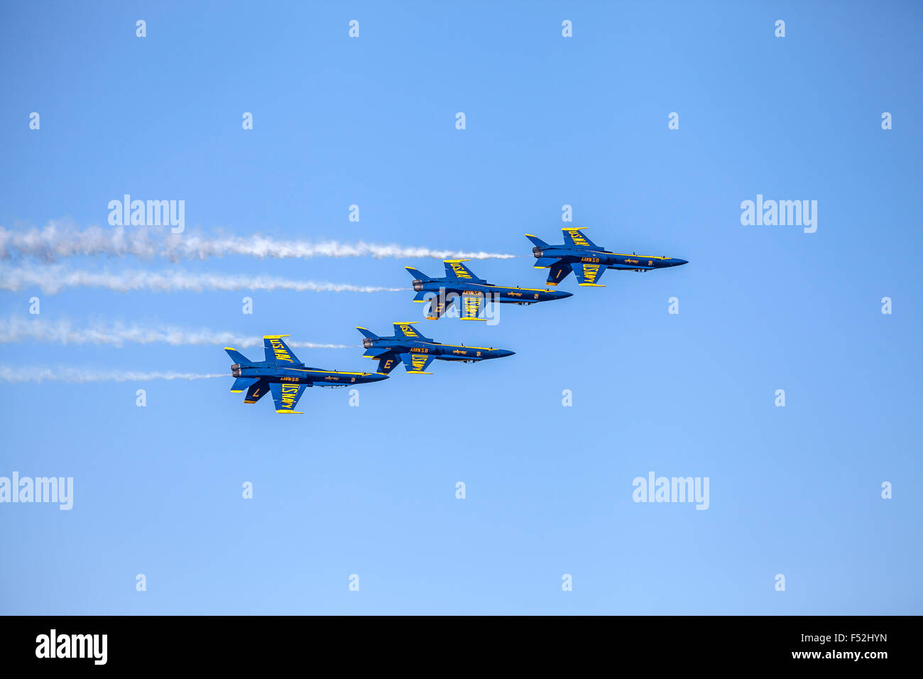 Blue Angels F/A-18 Hornet aircrafts performing flight formation, San Francisco, California, USA Stock Photo