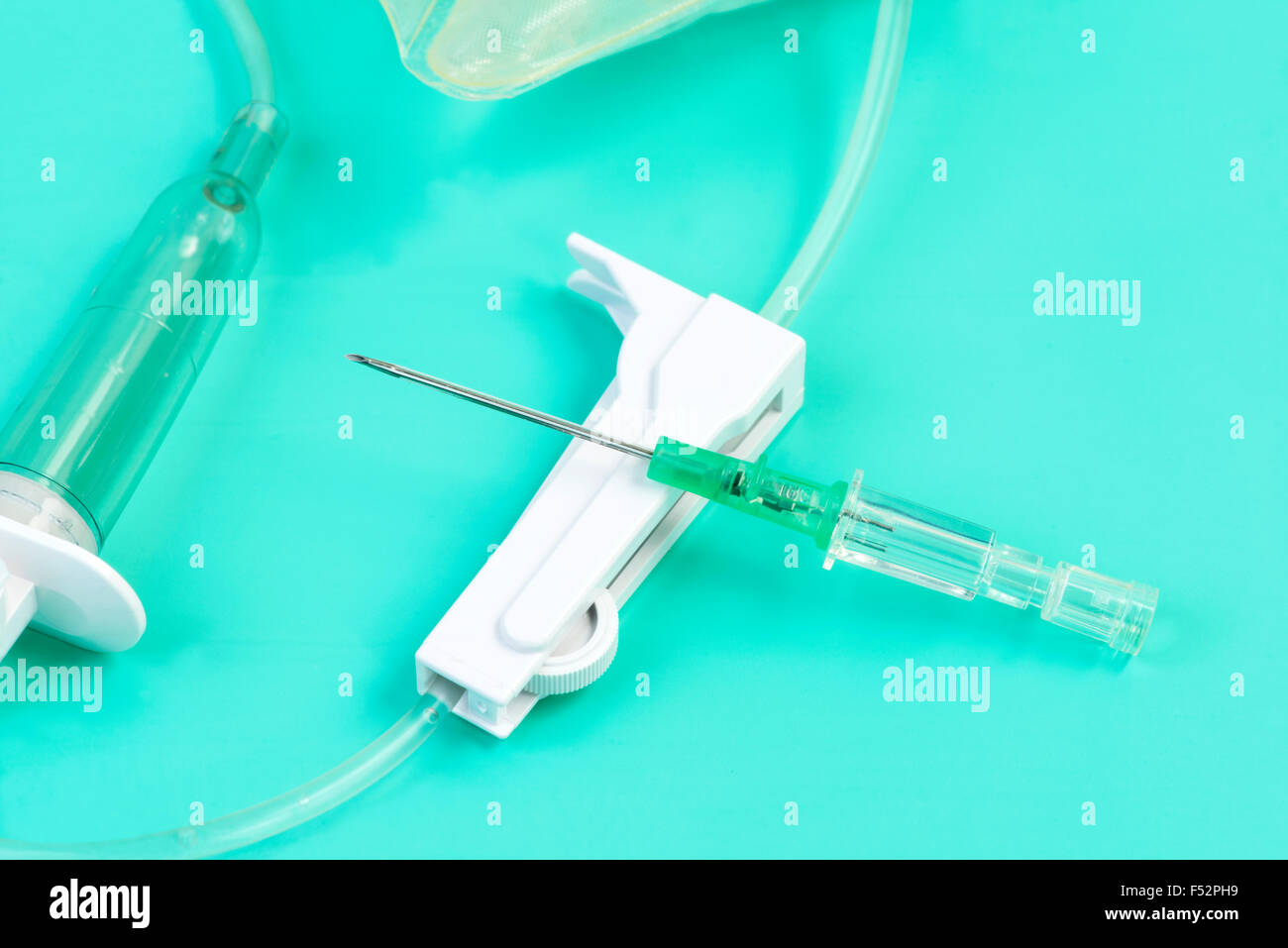 IV catheter with flow rate adjuster and solution bag Stock Photo Alamy