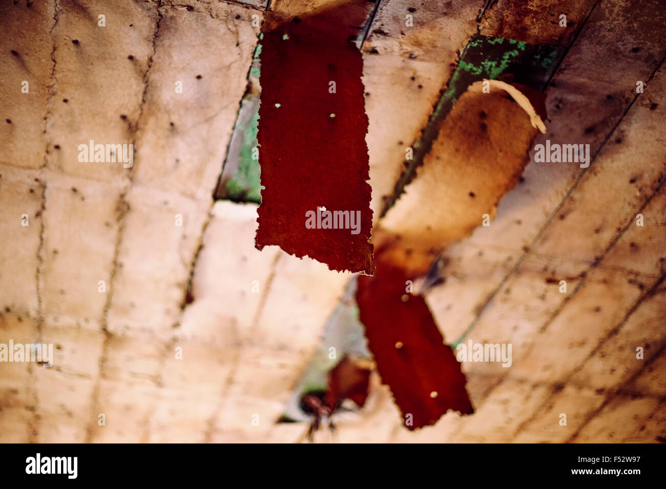 Asbestos Insulation Peeling From The Ceiling On An Empty Farm