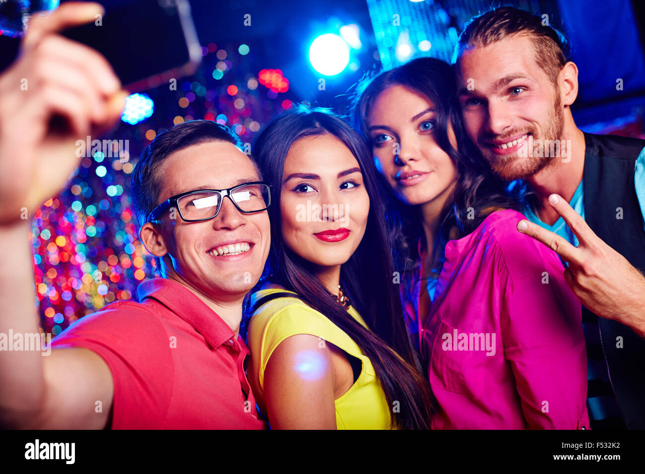 Young friends making selfie during party in nightclub Stock Photo - Alamy