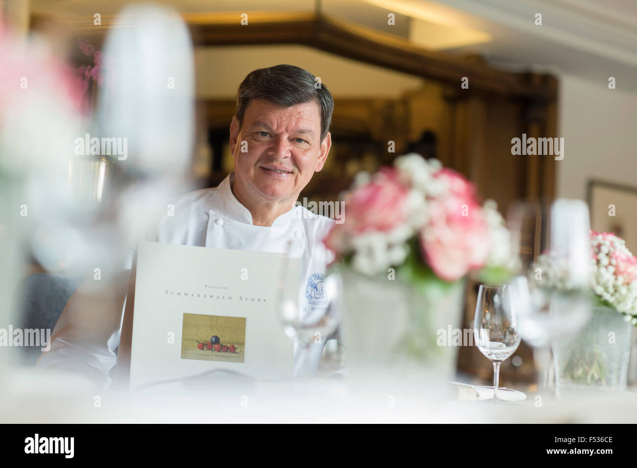 Baiersbronn, Germany. 23rd Oct, 2015. Star chef Harald Wohlfahrt sits in the kitchen of the Schwarzwaldstube at the Traube-Tonbach hotel in Baiersbronn, Germany, 23 October 2015. PHOTO: ULI DECK/DPA/Alamy Live News Stock Photo