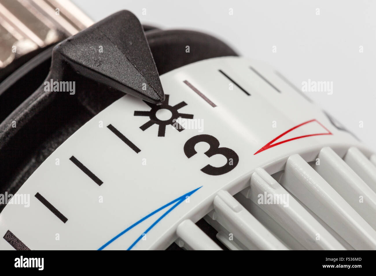 Heating thermostat, setting warm/cold, detail, symbolic image, energy