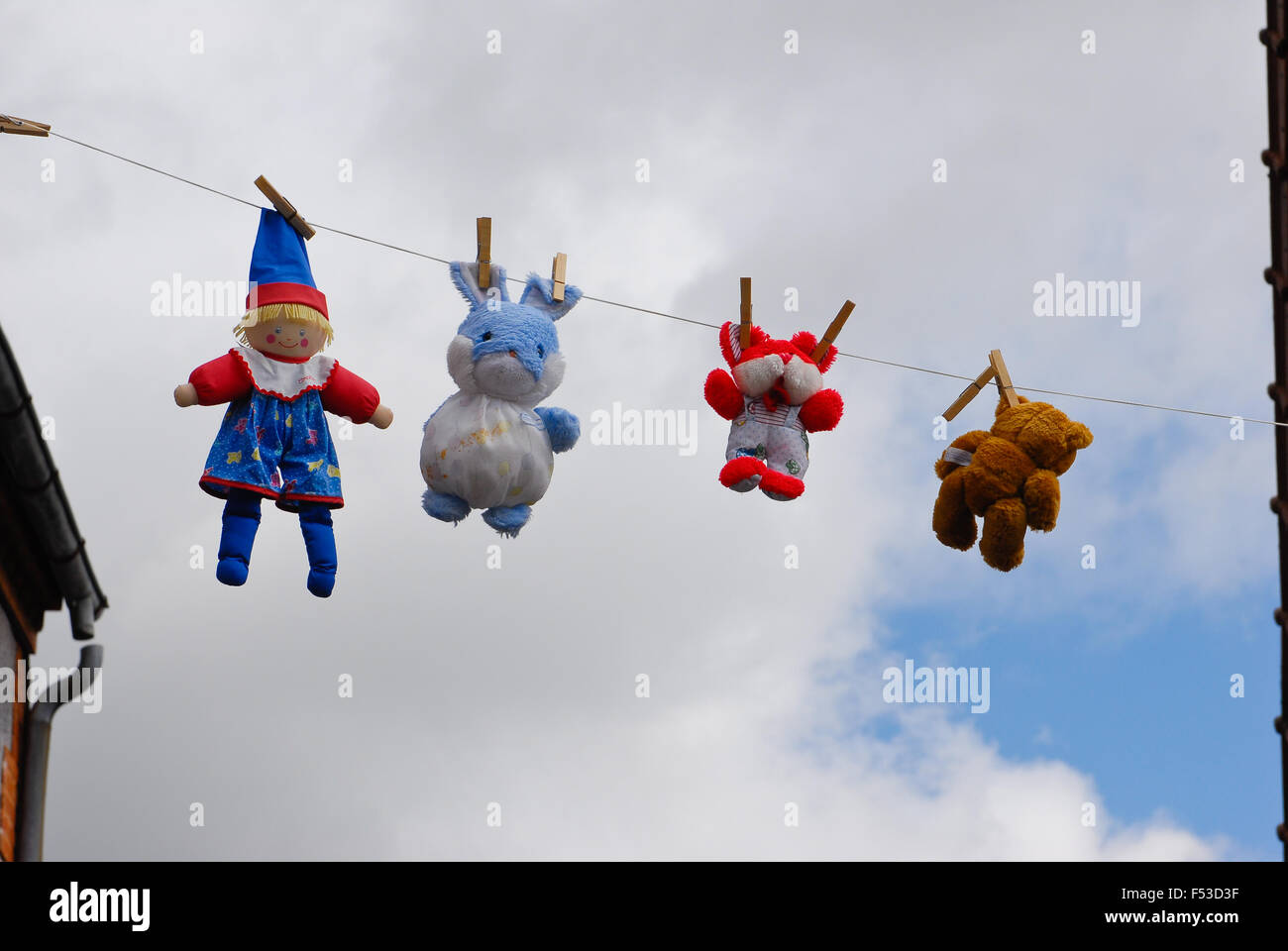 toys hung out to dry Stock Photo