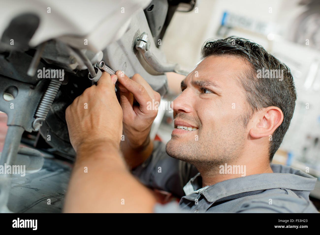 Workcomp Mechanic Mechanic at work Stock Photo - Alamy