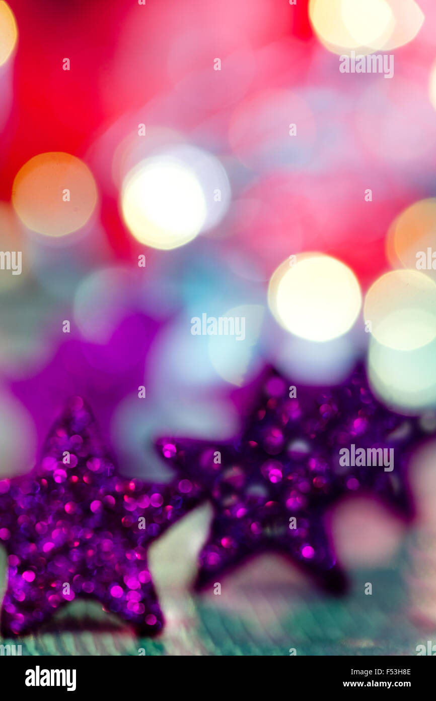 Christmas background with stars and colored glitter Stock Photo