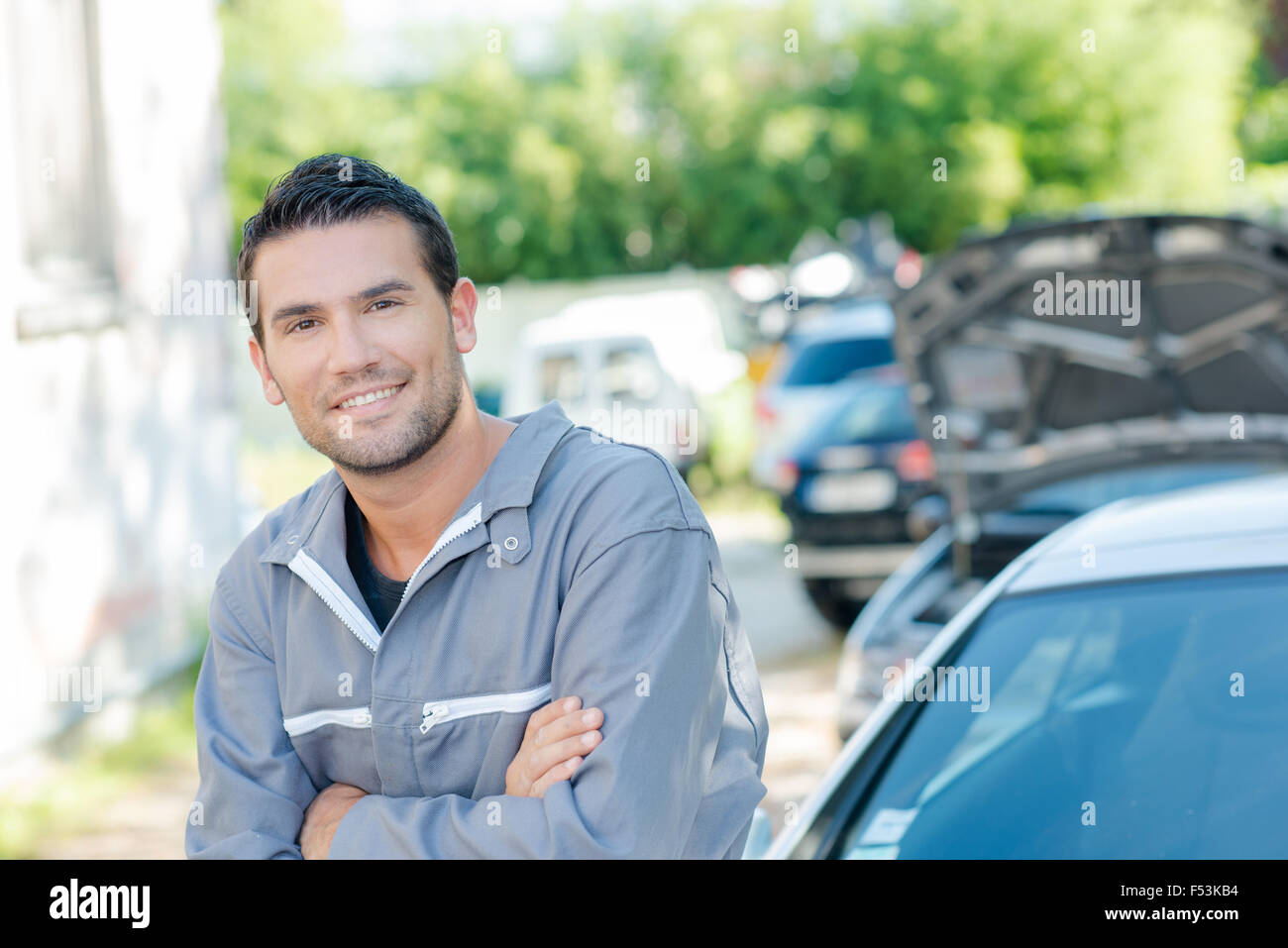 Mechanic wearing overalls Stock Photo Alamy