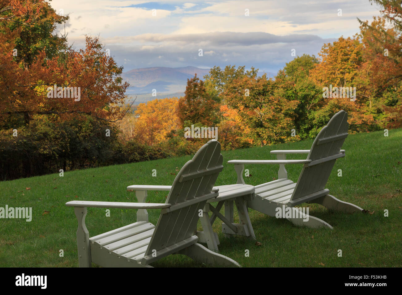 Adirondack chairs looking over Catskill Mountains in Fall, Hudson, New York, USA Stock Photo