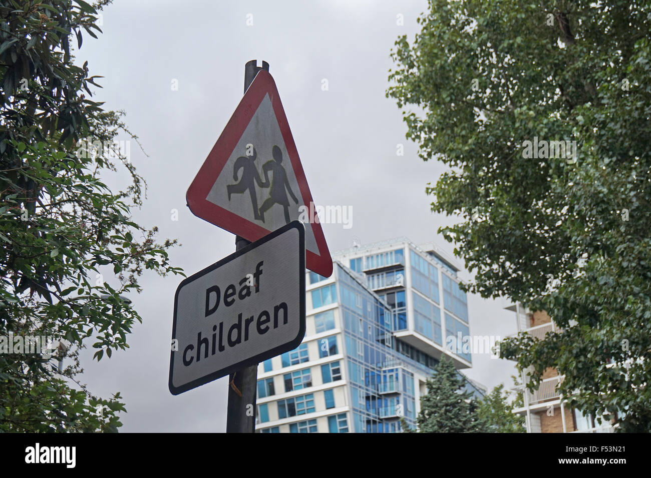 A sign showing a street crossing for Deaf Children, London, England Stock Photo