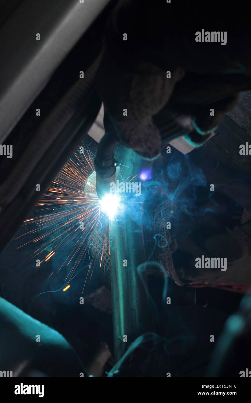 Sparks from electric welding at car repairs Stock Photo Alamy