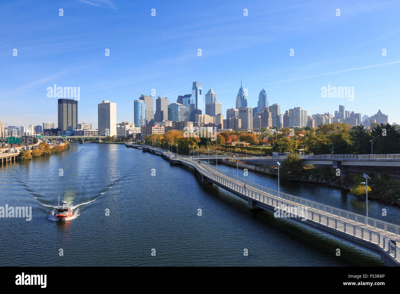Philadelphia Skyline and boat  with Schuylkill River Park Boardwalk, Philadelphia , Pennsylvania, USA Stock Photo