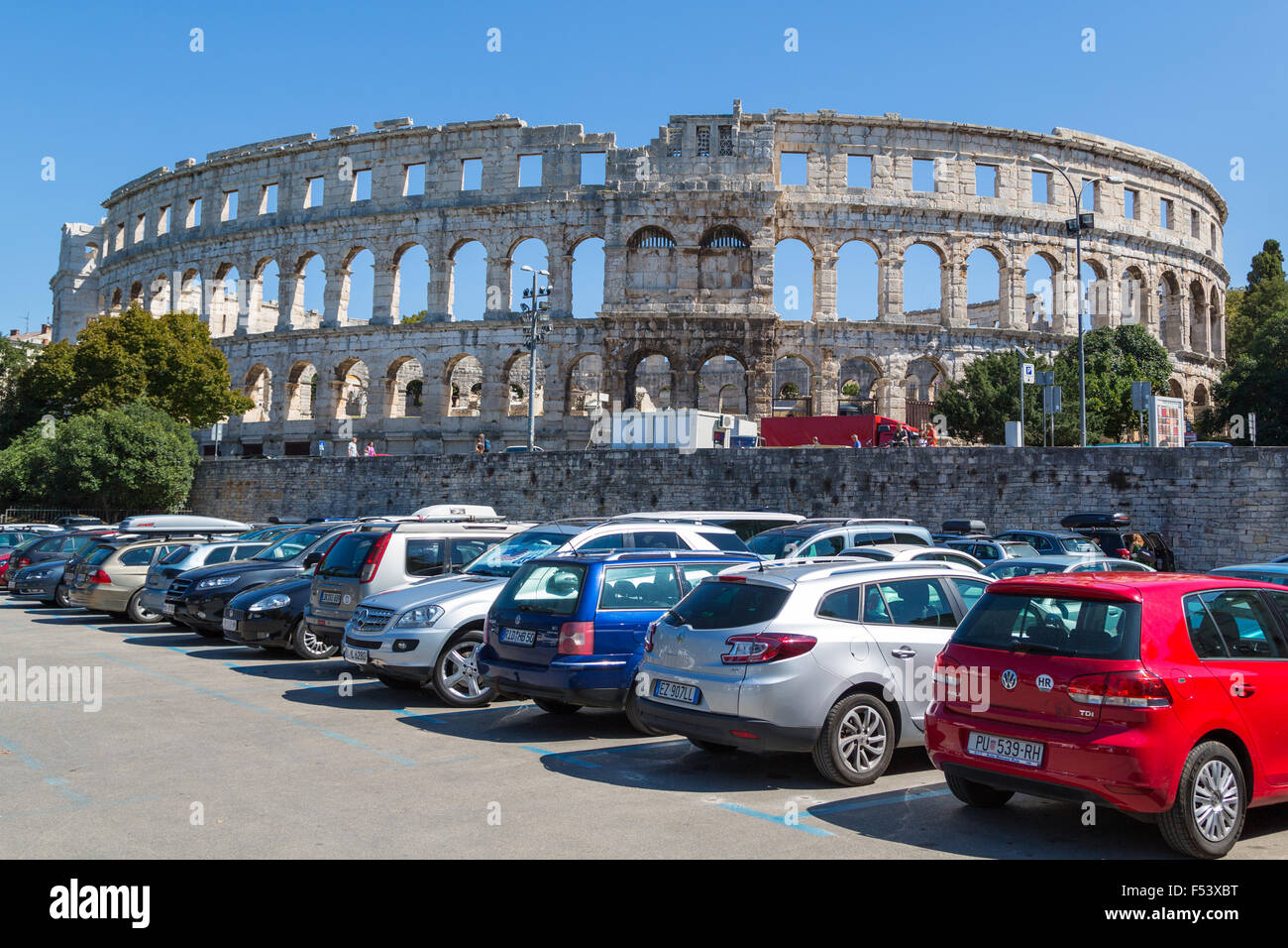 Roman amphitheatre, front parking lot, Pula, Istria, Croatia Stock Photo