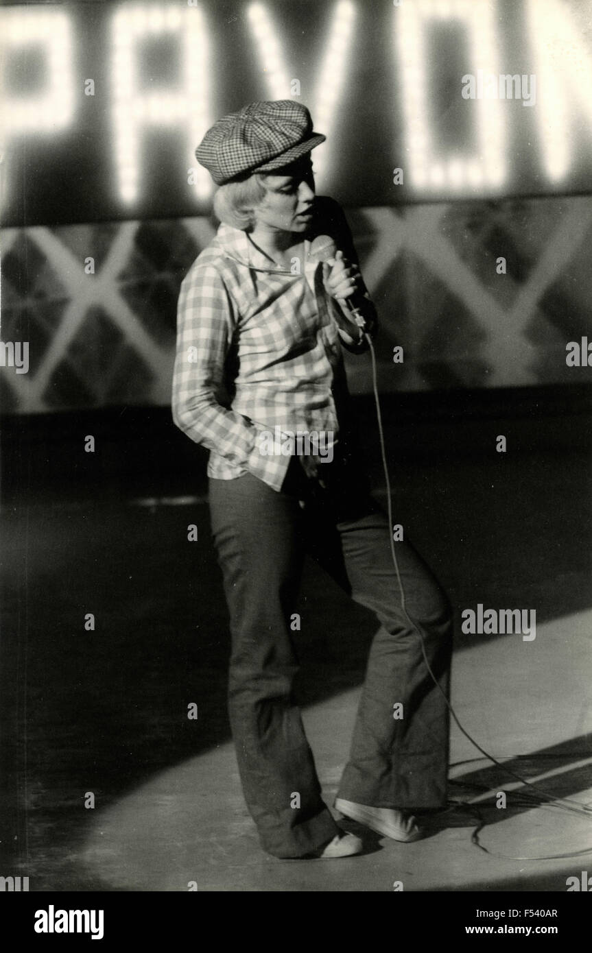 The Italian singer Rita Pavone during a performance Stock Photo - Alamy