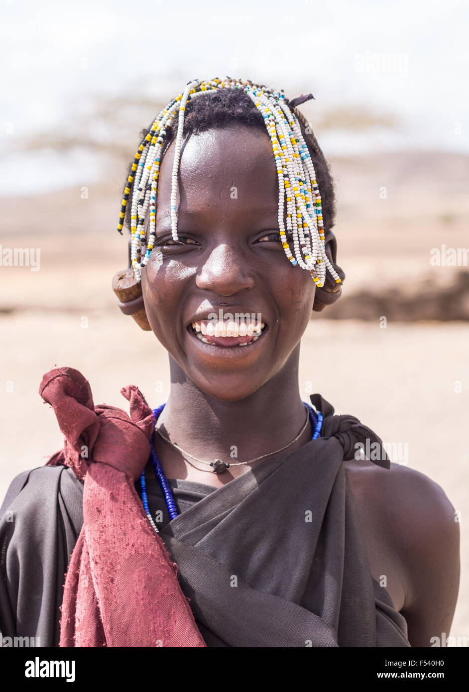Smiling Maasai young girl in Arusha region, Tanzania, Africa. Stock Photo