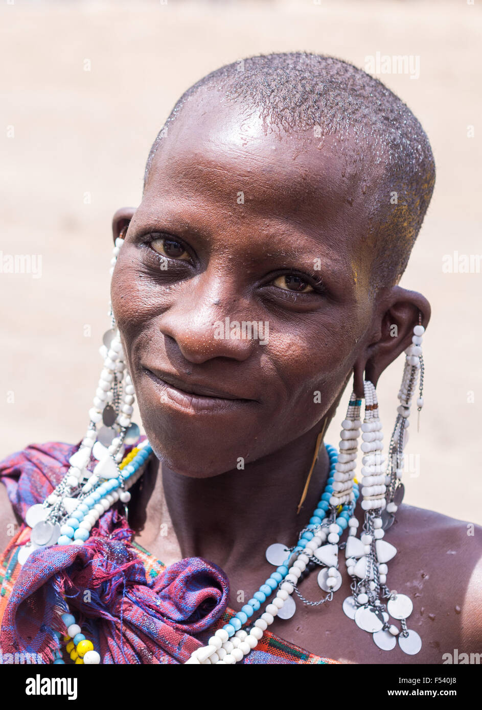 Smiling Maasai woman in Arusha region, Tanzania, Africa. Stock Photo