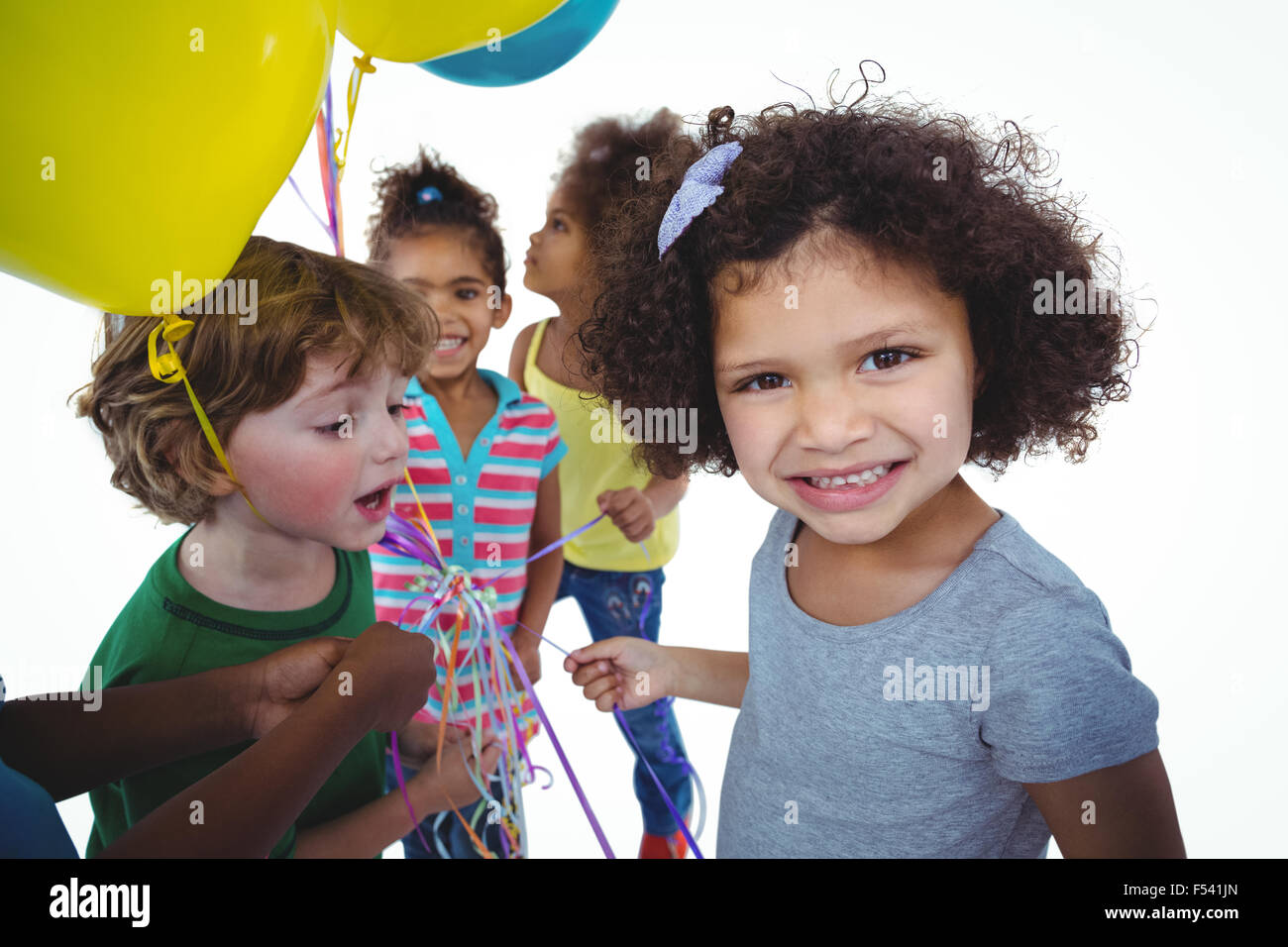 Kids with balloons hi-res stock photography and images - Alamy