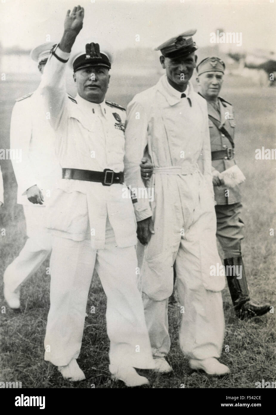 The Italian dictator Benito Mussolini in his white uniform salutes , Cameri , Italy Stock Photo