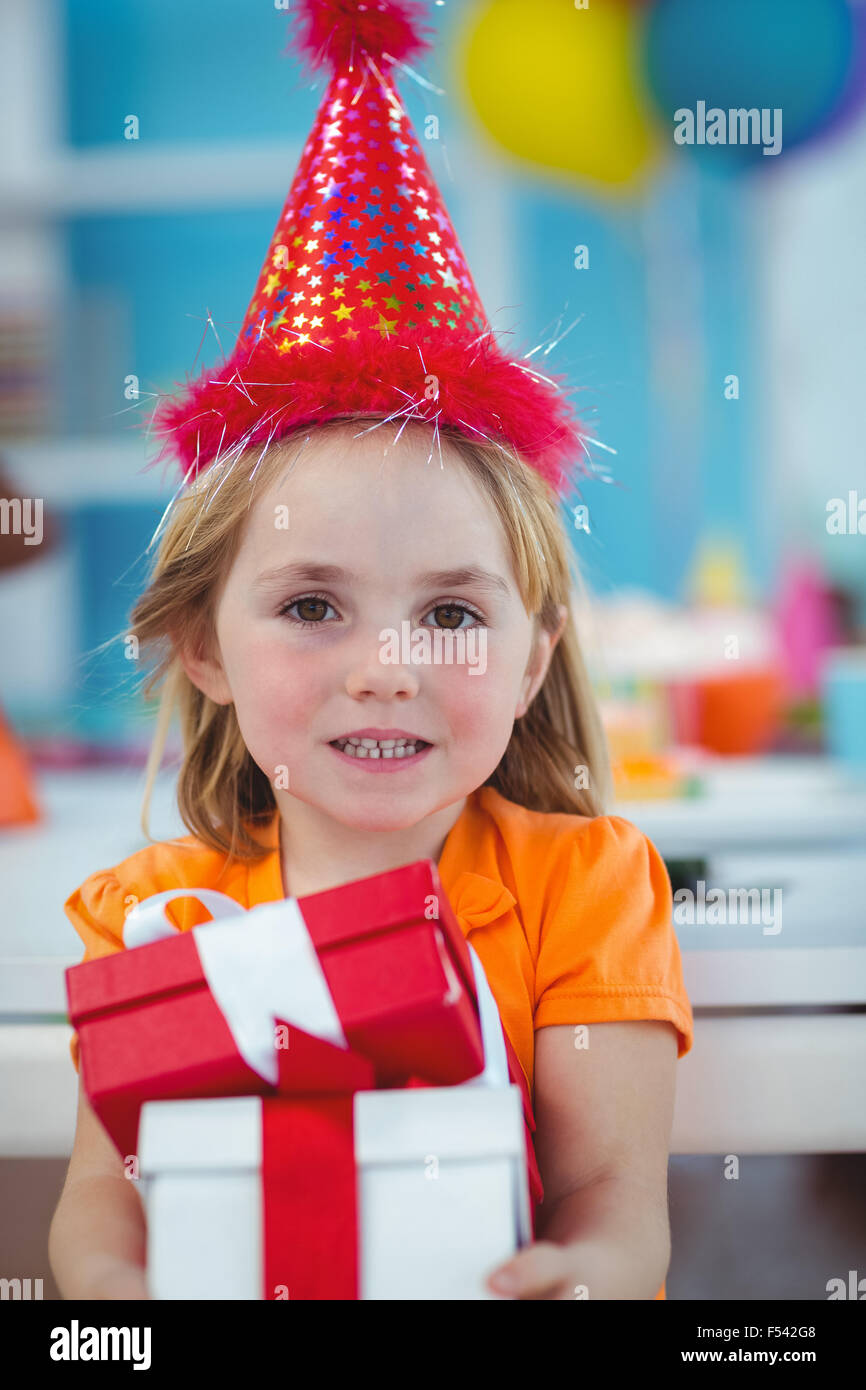 Smiling girl at birthday party Stock Photo Alamy