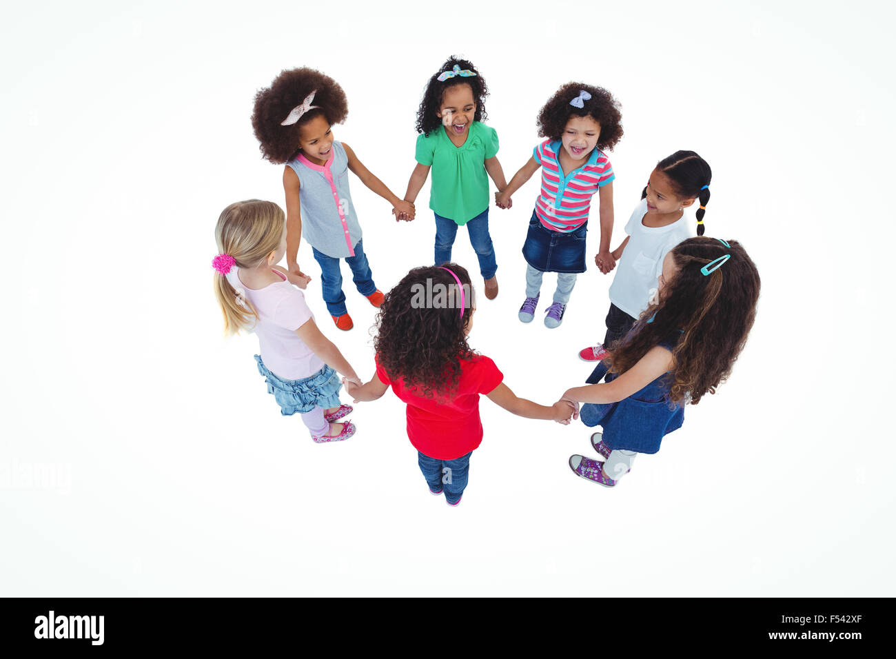 Girls holding hands in circle hi-res stock photography and images - Alamy
