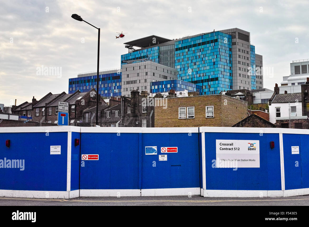 Evidence of the Crossrail construction in Whitechapel in Durward Street with the new Royal London Hospital in the background Stock Photo