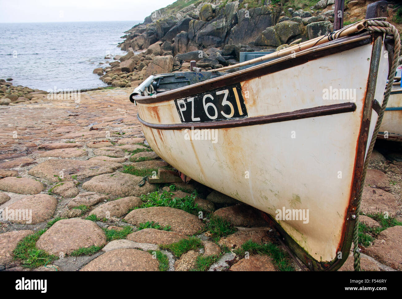 Fishing boat in Penberth hamlet near Penzance in Cornwall on cobbled
