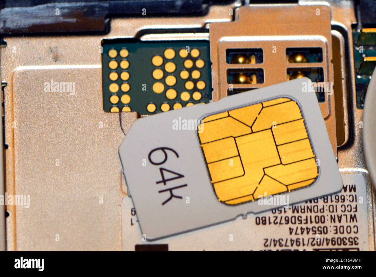 Mobile phone SIM card 64k Stock Photo Alamy