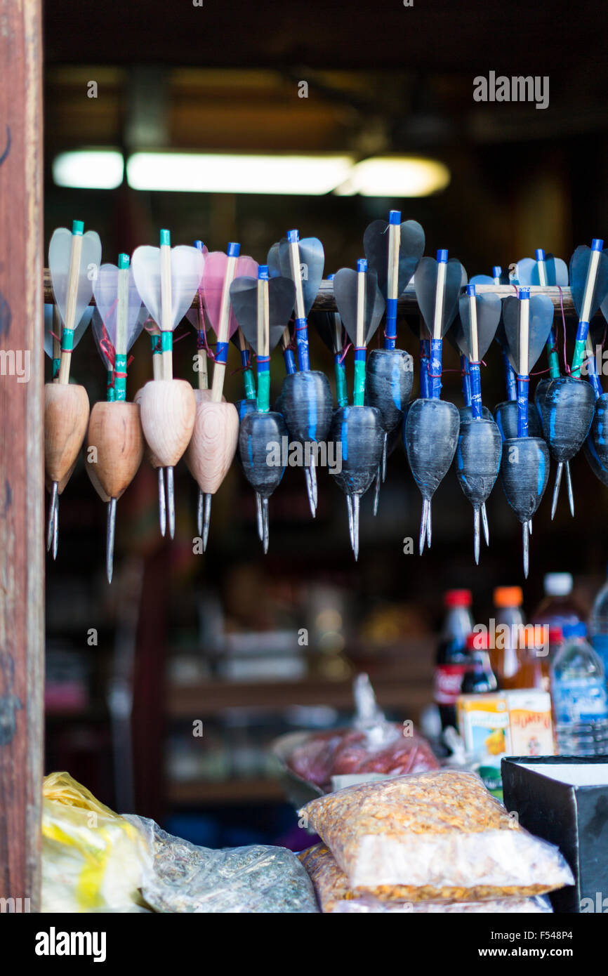 Darts in store front, Paro, Bhutan Stock Photo