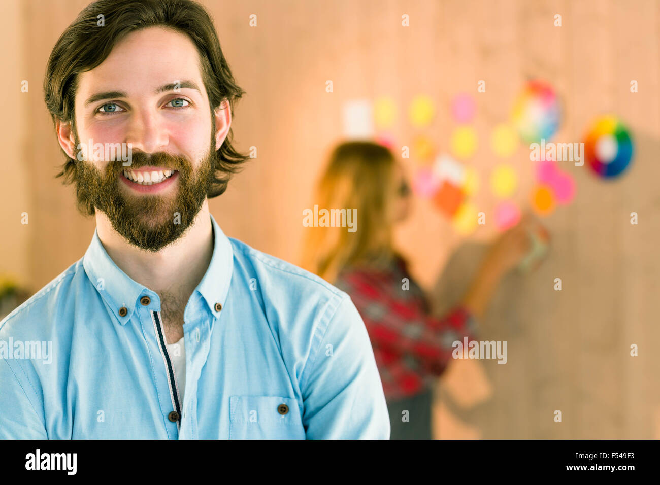 Creative man smiling at camera Stock Photo