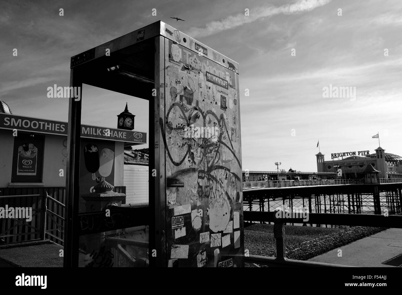 Derelict BT telephone box on Brighton seafront by Brighton Pier