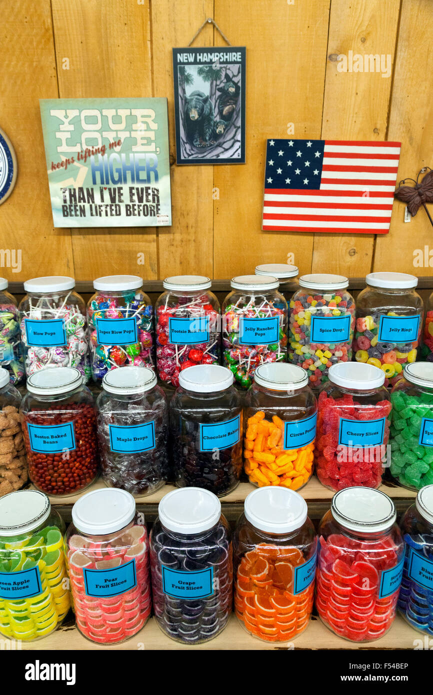 American candy in jars on the shelf of Chutters candy store; Littleton, New Hampshire, USA Stock Photo