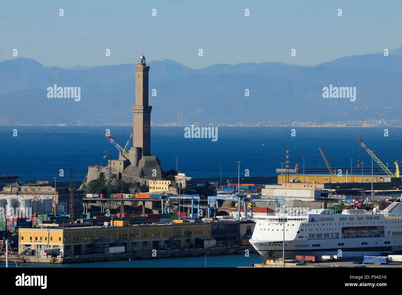 Skyline of Genoa from the harbor. The lighthouse on the left, called 'La Lanterna' is the main city landmark Stock Photo