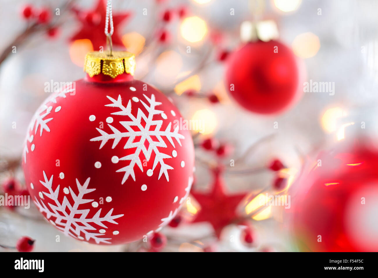 Red ball with snowflake hanging on tree Stock Photo - Alamy