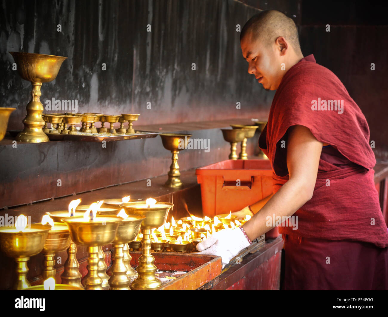 Monk in Ganden Sumtseling Monastery, also known as Sungtseling and Guihuasi is a Tibetan Buddhist monastery. Stock Photo