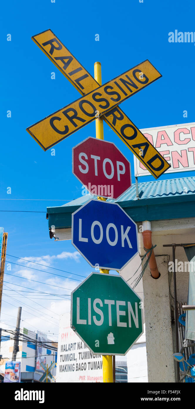 Railroad crossing stop look and listen hi-res stock photography and ...