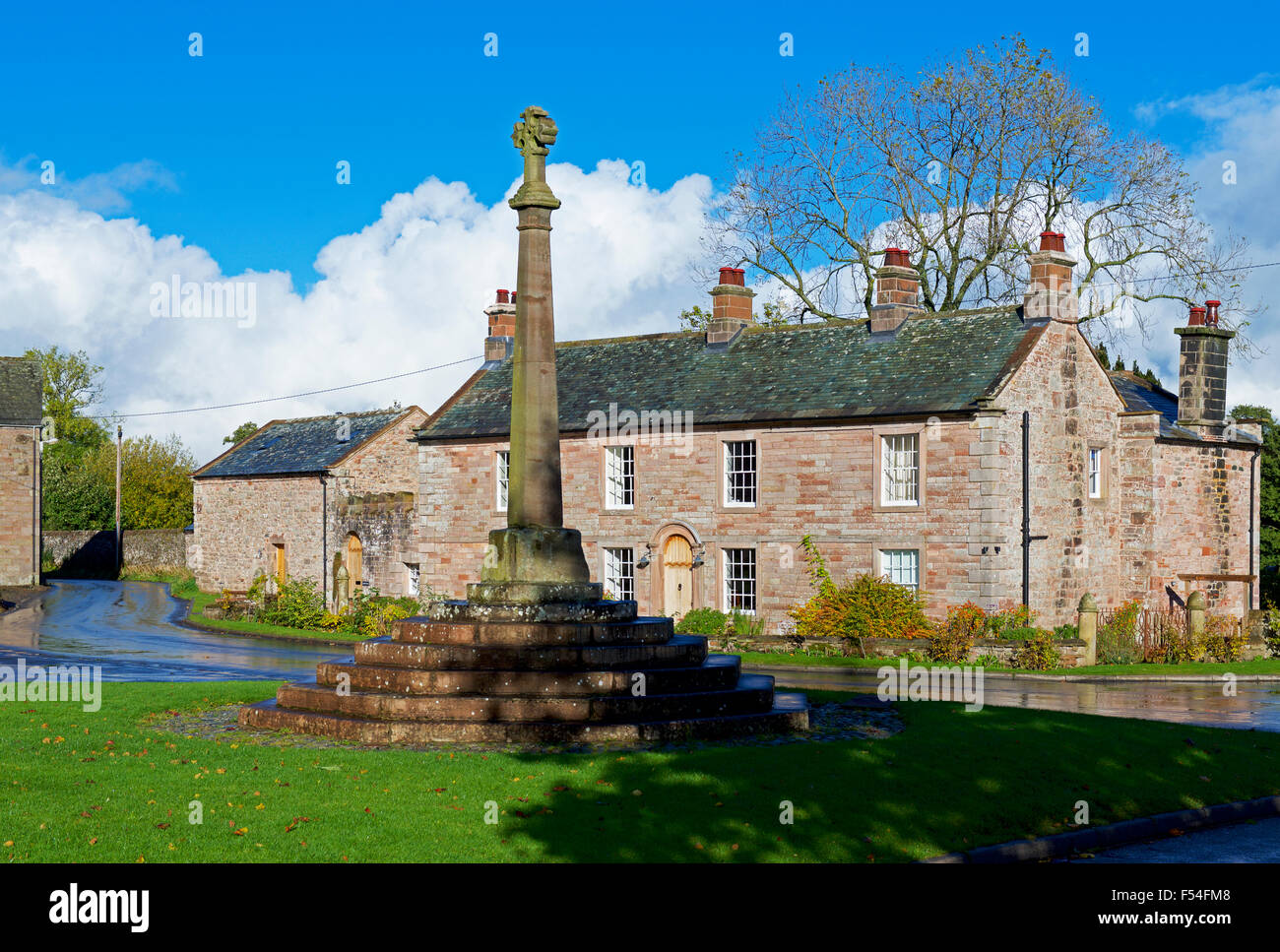Village cross and house, Greystoke, Cumbria, England UK Stock Photo Alamy