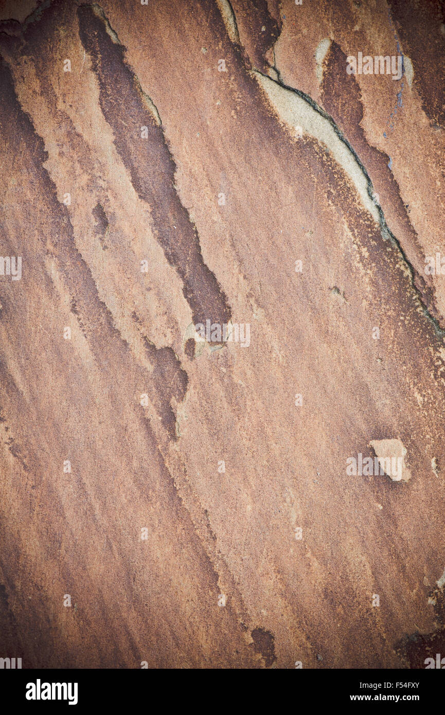 Brown flat rock surface abstract, colored stone texture, wall surface background in vertical orientation, nobody... Stock Photo