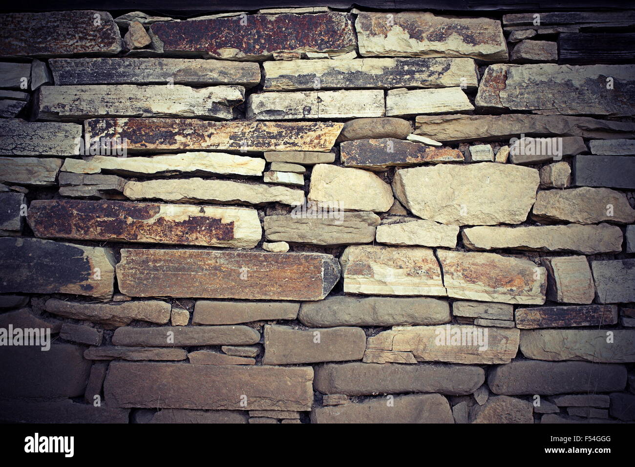 vintage look of stone texture with vignette for your exterior architectural design Stock Photo