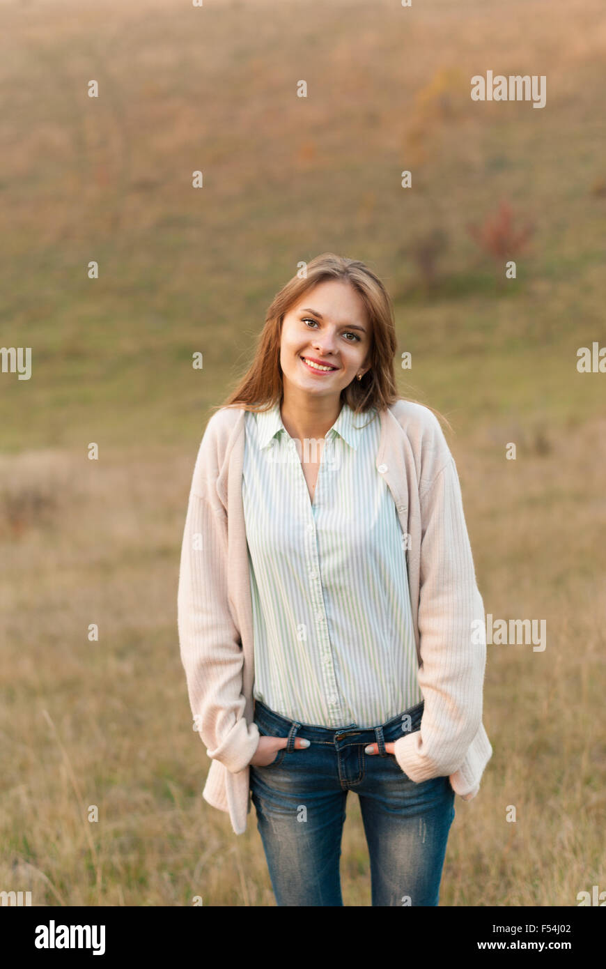 Portrait of a beautiful smiling girl outdoors Stock Photo - Alamy