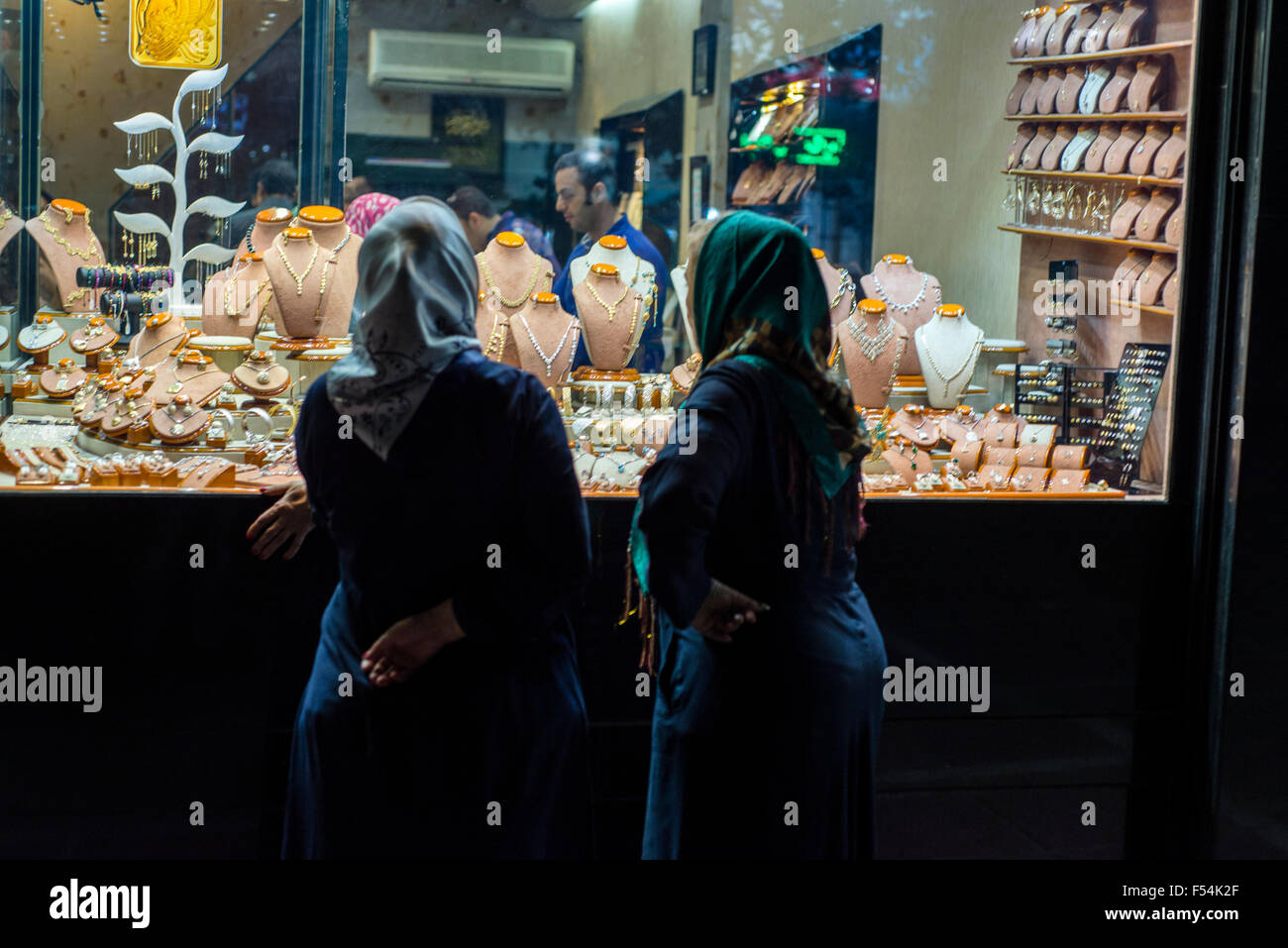 Two Iranian women looking jewelry in Tehran, Iran Stock Photo
