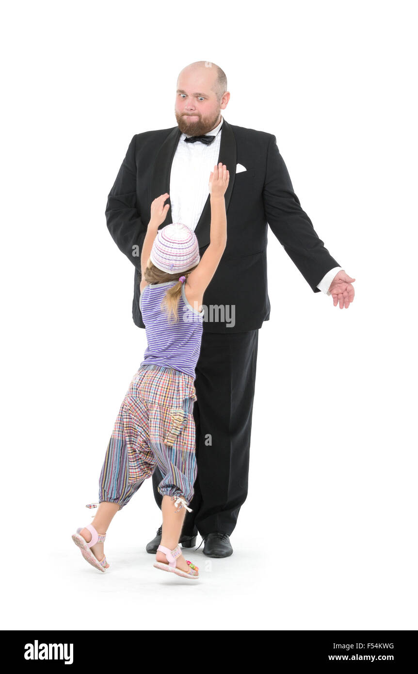 Little Girl and Servant in Tuxedo Have Fun, on white background Stock Photo