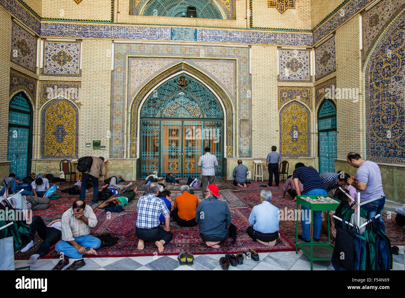 Muslims pray in Imam Khomeini Mosque, Tehran, Iran Stock 