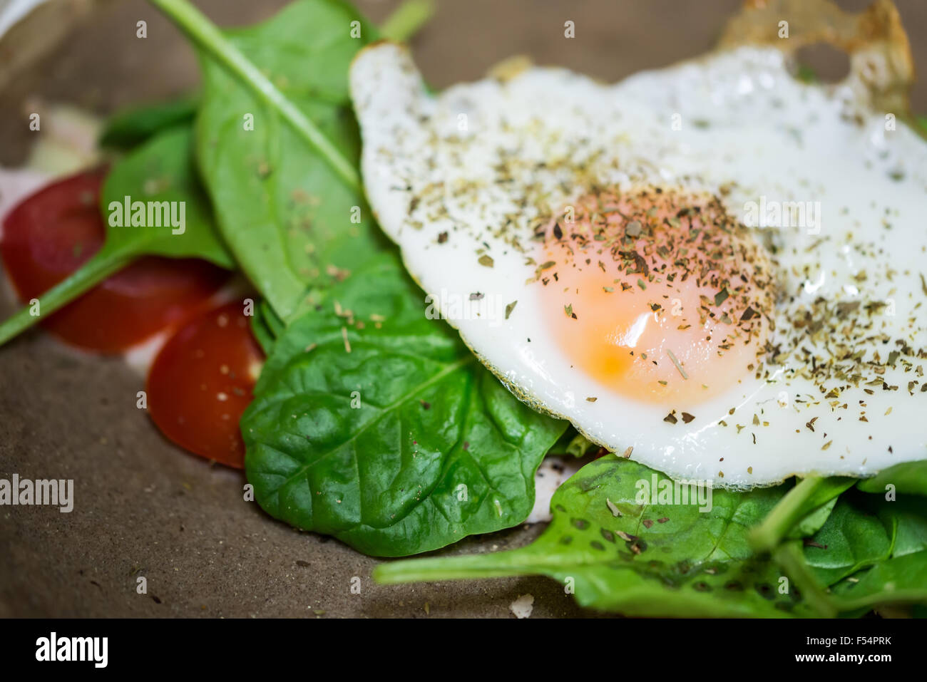 Egg & Spinach Wrap with Tomatoes and cheese Stock Photo Alamy