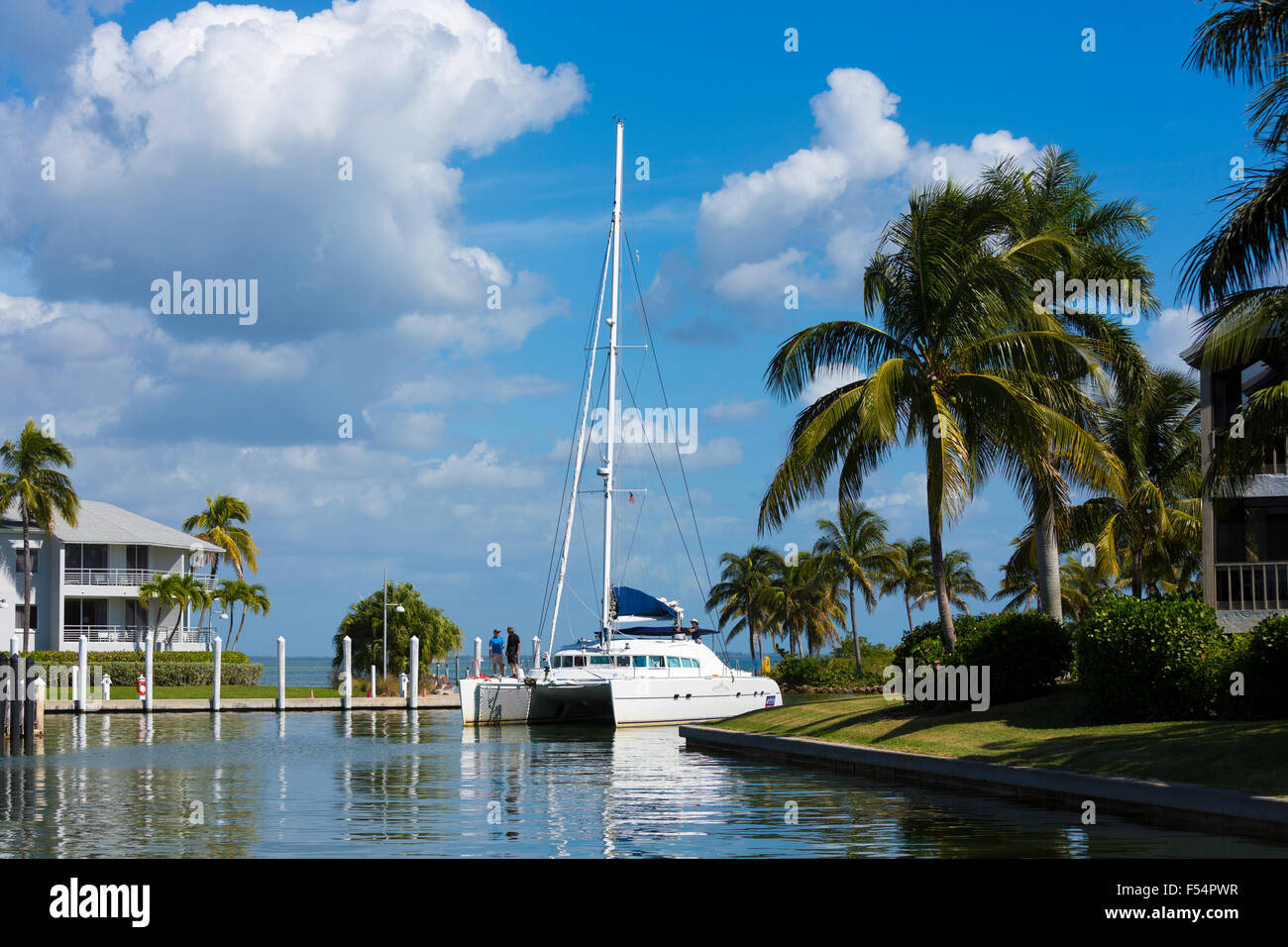 Luxury catamaran yacht sailing into port at upmarket South Seas Island Resort on Captiva Island in Florida, USA Stock Photo
