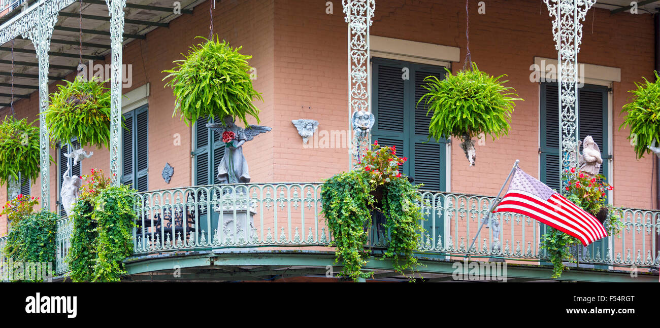 Typical architecture wrought iron balcony, on corner of St Philip and Royal Street, French Quarter, New Orleans, USA Stock Photo
