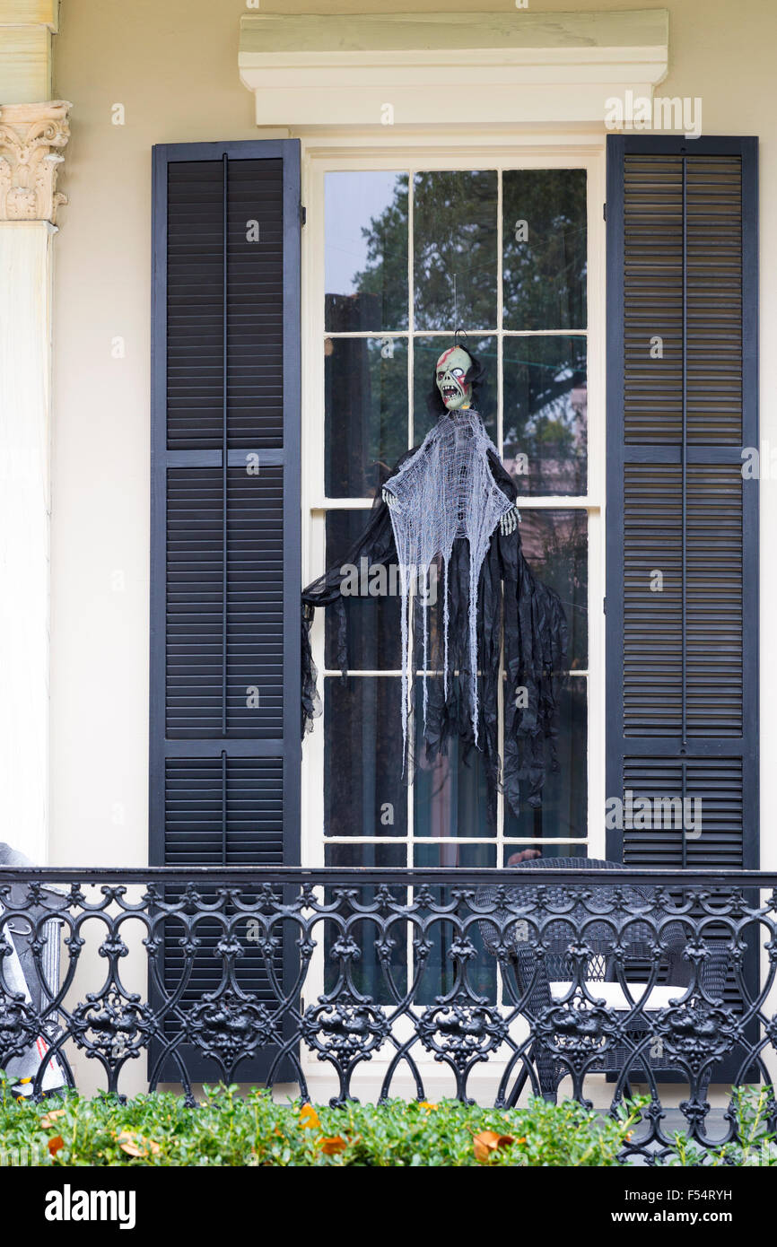 Scary Halloween voodoo skeleton ghost character at mansion house in the Garden District of New Orleans, Louisiana, USA Stock Photo