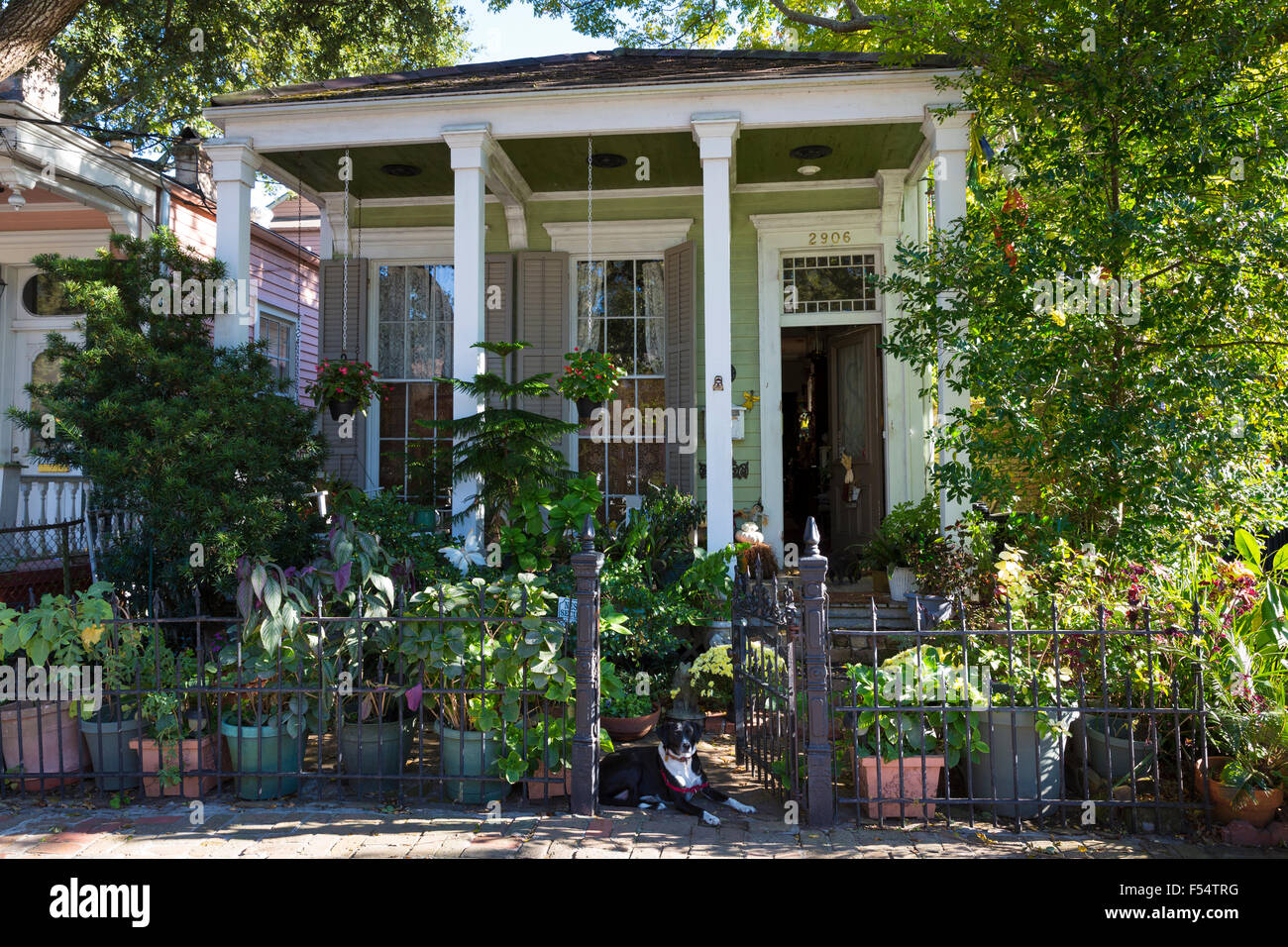 Traditional clapboard cottage house  with columns in the Garden District of New Orleans, Louisiana, USA Stock Photo